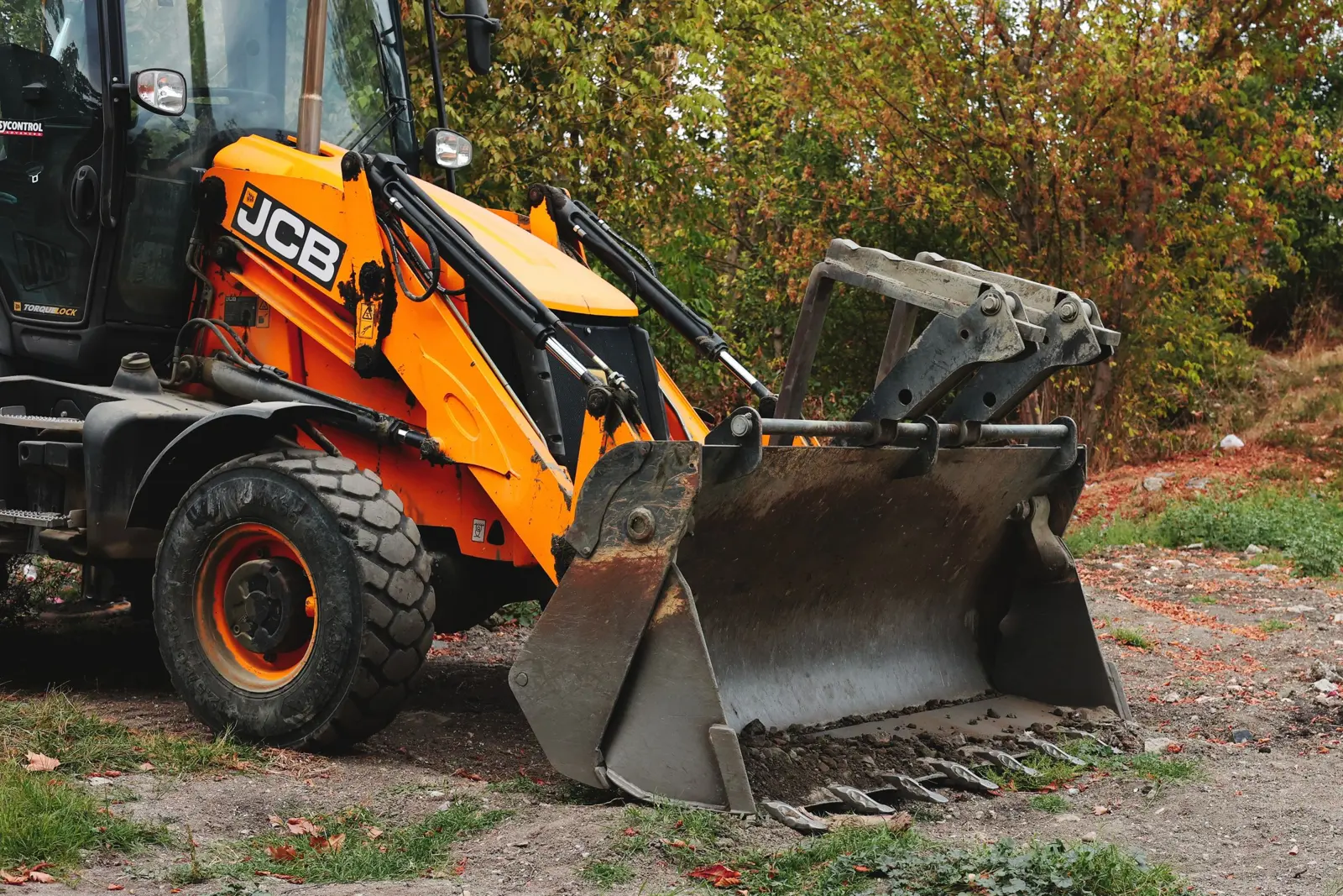 JCB backhoe loader on a groundworks site